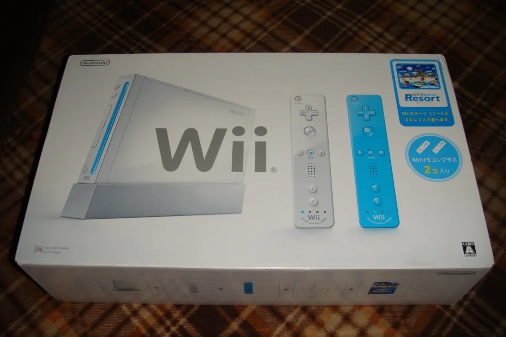  Nintendo Wii Sports Resorts +  Blue Wiimote Bundle