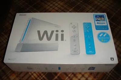 Nintendo Wii Sports Resorts +  Blue Wiimote Bundle