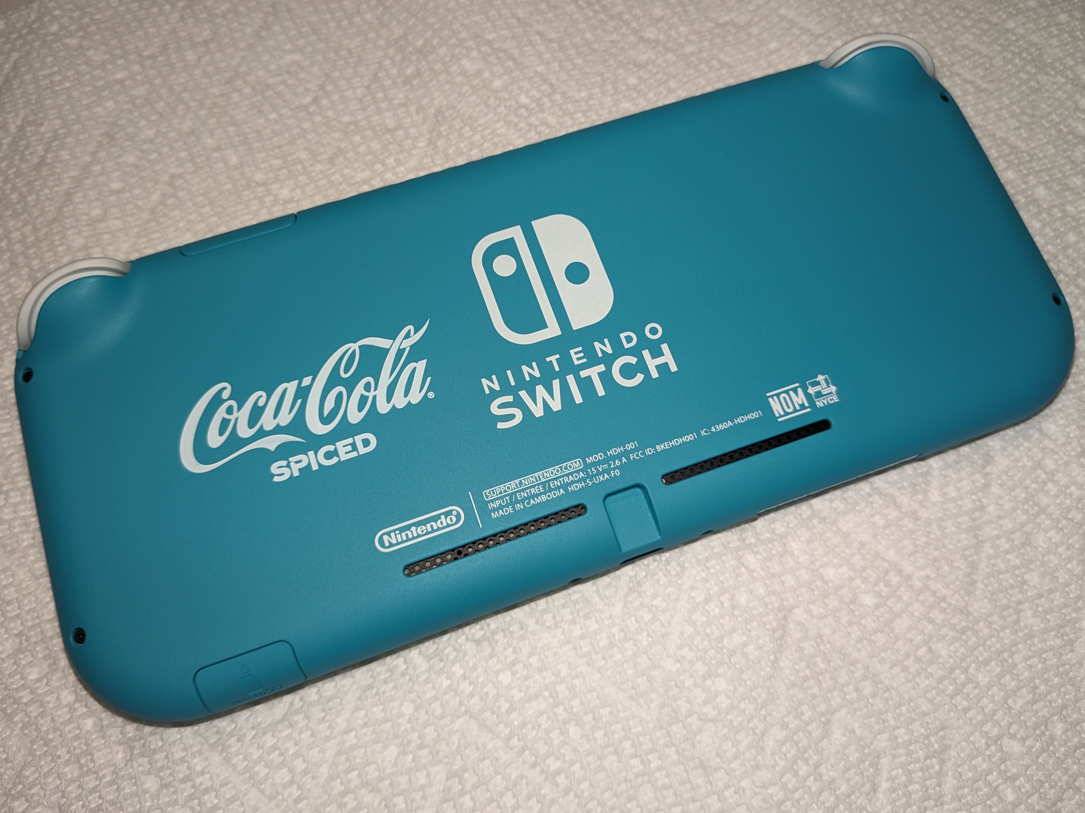 Nintendo Switch Lite Coca-Cola Spiced Console