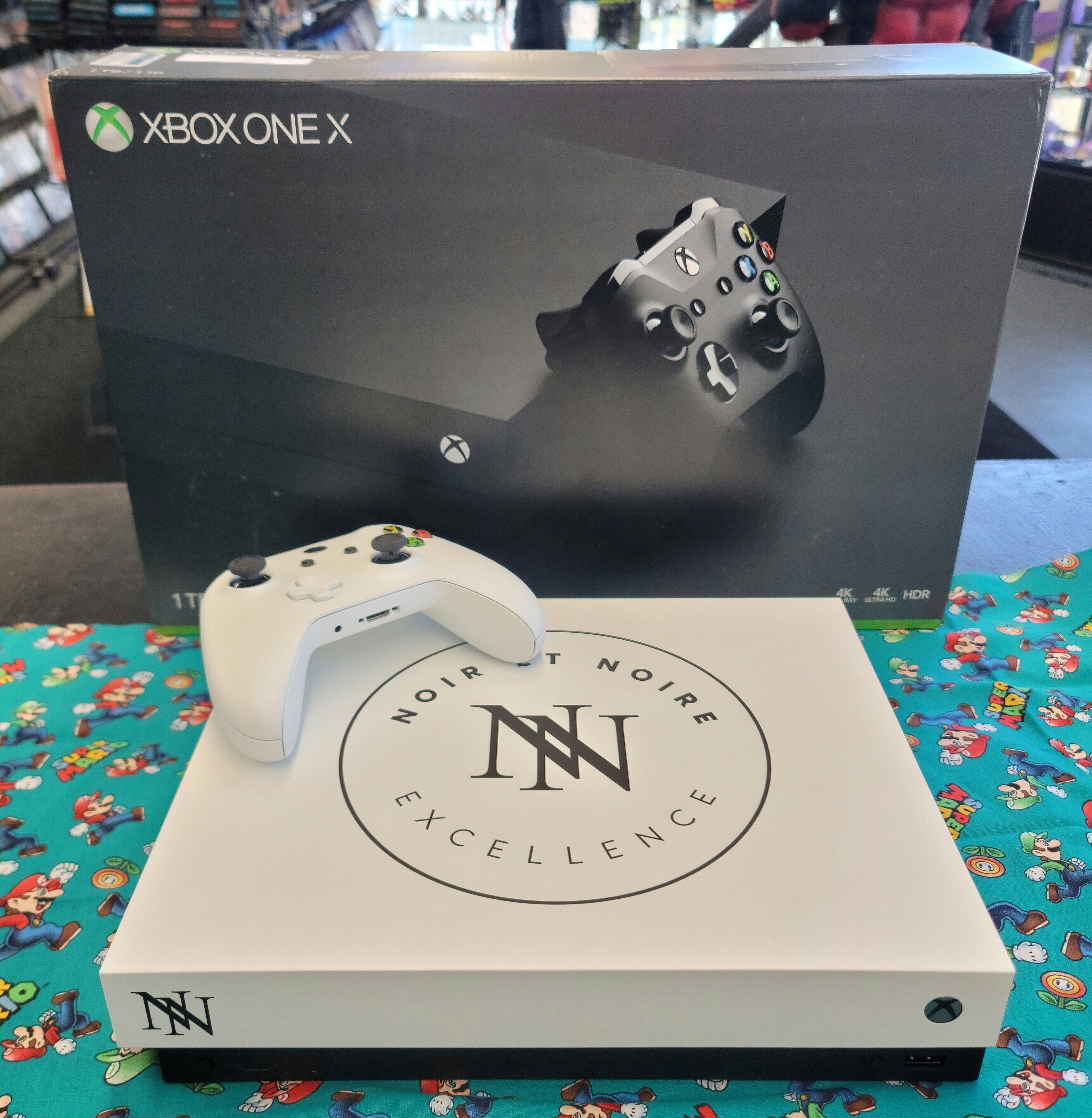  Microsoft Xbox One X Noir et Noire Excellence Console
