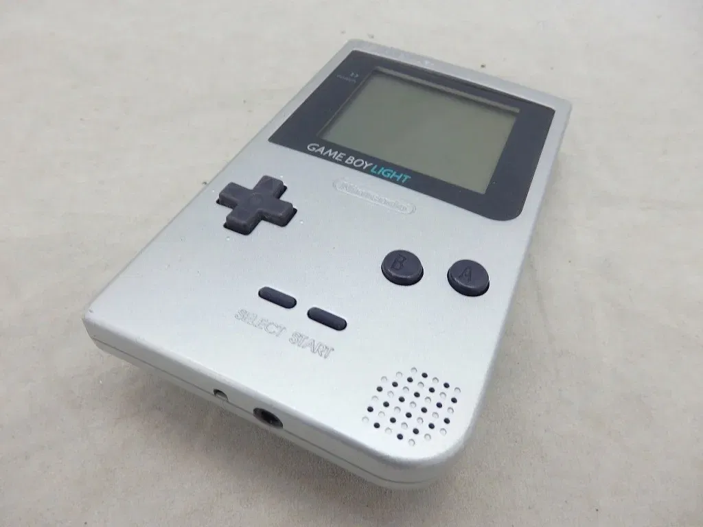 Nintendo Game Boy Light Silver Console - Consolevariations Nintendo Game Boy Light Silver Console - Consolevariations